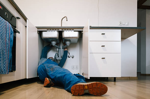 Professional Drain Cleaning technician working in Reno, TX